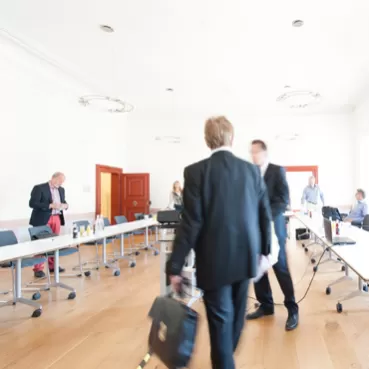 Meeting bei dem die Zusammenarbeit im Führungsteam optimiert werden soll